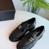 CHANEL Black Leather Loafers with Gold-Tone Logo