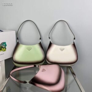 Cleo glossed-leather shoulder bag - Dubai Fashion LUX