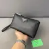 Design logo-plaque clutch bag - Dubai Fashion LUX