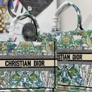 Introduced by Maria Grazia Chiuri , the Book Tote has become a staple of the aesthetic. Designed to hold all the daily essentials, the style is fully embroidered with the ecru...