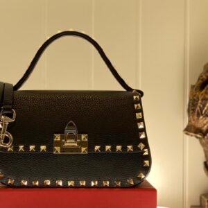 ROCKSTUD GRAINY CALFSKIN POUCH - Dubai Fashion LUX
