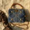 SMALL ROMAN STUD THE HANDLE BAG IN DENIM - Dubai Fashion LUX