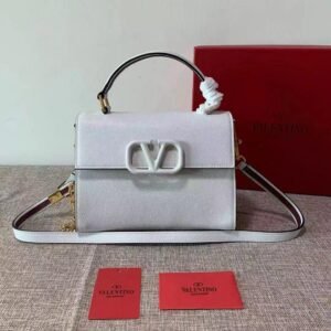 Small Vsling Grainy Calfskin Handbag Coral - Dubai Fashion LUX
