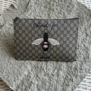 Gucci GG Supreme Pouch Bag